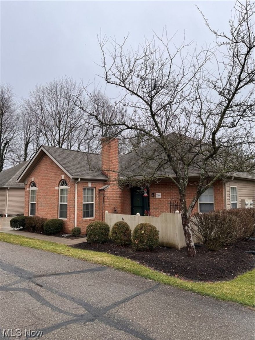 Welcome to this beautiful, move-in ready condo in the desirable Bayberry Woods.  The living room has vaulted ceilings with a brick gas fireplace and is open to the dinning room and kitchen. The kitchen is updated with beautiful quartz countertops, marble backsplash, gray cabinets, deep stainless steel sink, and stainless steel appliances. Half bath has been updated with new vanity. Spacious owners suite with ensuite bath and walk-in closet. New lighting fixtures throughout. Newer custom screen door. The deep attached garage allows plenty of storage with access to the attic. Updates include Furnace (2023), A/C (2023), Hot Water Tank (2023), Custom Screen Door (2021), Kitchen (2020), Half Bath (2020). Listing agent related to seller.