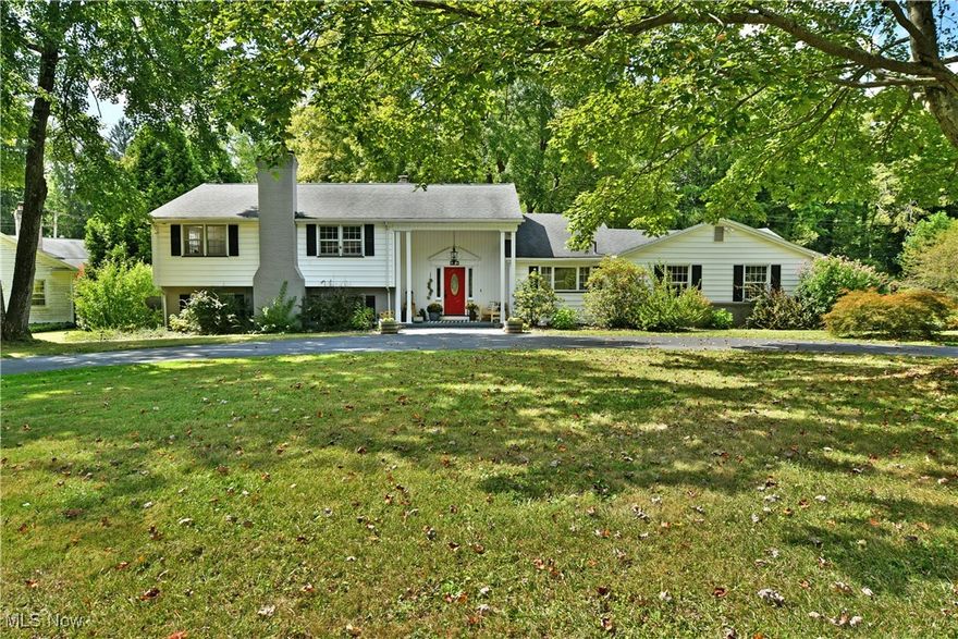 Eclectic, extravagant and packed full of sleek, modern updates; this breathtaking Liberty 
Township estate is poised to excite and waiting for you! Outstretched along a wide, double 
lot, the home sits off the road behind a wrought iron and stone fence line as a circling 
driveway makes entry and exits a breeze. A prominent covered porch reveals a bold, red 
entry door that opens to a daring foyer with tall ceilings, elegant lighting and must-see 
custom tiled flooring that easily sets this one apart from its peers. Meanwhile, the central 
living room extends outward with its magnificent overhead wooden beams and hardwood 
styled flooring below. Around the corner, formal dining awaits as sunshine spills through 
the large, lattice-lined windows. Don’t miss the striking kitchen with its large center island 
and stainless appliances that complement the stormy colored cabinetry. Casual dining 
waits nearby along with a charming half bath. Upstairs, the main hall branches away into a 
trio of impressively spacious bedrooms with warm, inviting surroundings. At the end of the 
hall, a gorgeously updated full bath awaits with an elegantly tiled shower. Meanwhile, the 
oversized master suite includes its own updated full bath. Downstairs, laundry service 
joins an additional fourth bedroom with instant access to a full lower bath. The decadent 
lower family room homes a corner wet bar and elaborate fireplace; all set before the 
finished sunroom to complete the package!