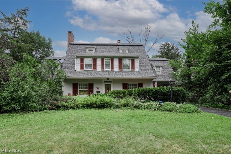 Move right in to this charming center hall colonial that is brimming with classic Cleveland Heights charm! This delightful home provides 2,456 square feet of living space with a gracious floorplan in a convenient location moments from Cedar Fairmount, University Circle, Coventry and more! The front porch opens into a charming foyer. To your right, you will find the formal dining room with classic features like dentil molding and a butler's pantry. To the left, you'll find the spacious living room with a fireplace and gorgeous hardwood floors that flow into the family room. The kitchen is updated with granite counters and all appliances, plus there is a sunny eat-in nook! A half bathroom and a gorgeous sunroom complete the first floor. There are four bedrooms and two bathrooms on the second floor, including the owner's suite, which includes a walk-in dressing room that connects to the beautifully renovated en-suite bathroom. Plus, one bedroom includes a balcony. On the third floor, ther