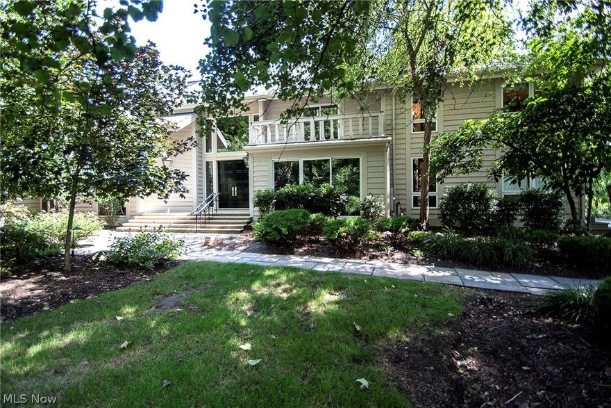 Auction (Not a live on-site auction) SUBMIT OFFERS NOW! Auction date is deadline for bids which are reviewed daily. An offer may be accepted at anytime. List Price is the Suggested Starting Bid. Welcome to your Contemporary, Rustic and One-of-a-kind custom home on a breathtaking Hunting Valley setting minutes from Chagrin Falls. Artfully placed walls of windows throughout blend interior spaces with picturesque views of natural surroundings. Perhaps most remarkable is the palatial great room with hand hewn beams, stone fireplace & walk-in wet bar. The state-of-the-art kitchen with adjoining hearth room uses wormy chestnut retrieved from a KY farm in its custom cabinetry & ceiling beams. Maple flooring, wall of windows and a 9x10 center island crown its appeal. White washed knotty pine constructs the sunroom achieving a tree house ambiance. Spend summer days overlooking the pool, 2 level paver patios, gas fire pit & serene Griswold Creek. The formal dining room captures a deep, shadowy feel of Sherwood forest. His & Her studies flank the hallway to the Master wing where His/Her closets/bathrooms with 20 ft ceilings take on high drama while allowing opportunity for further customization. The 2-story master, with private screened room & walkway to hot tub, allows a tranquil oasis. 3 bedrooms, 2 full baths & reading loft UP. The finished LL walks out to the pool and is highlighted by an English pub, exercise room, full bathroom & media room. 1 bed guest home over the 4-car garage.