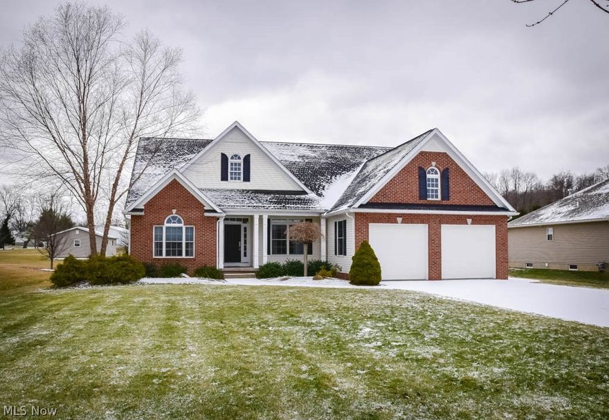 Welcome to your dream home! Breathtaking entrance with vaulted ceilings and an open floor plan, this 3 bedroom, 2.5 bath home is guaranteed to wow you! Indulge your inner chef in the gorgeous kitchen featuring new granite counters, stainless steel appliances, convection microwave, touch faucet, integrated sink, a breakfast bar, pantry and tile backsplash. Enjoy family time in the great room with a gas fireplace and new laminate flooring. Host dinners in the gorgeous dining room. Boasting a beautiful pillar, wainscoting, new carpet and a tiered ceiling, this room is sure to make an impression! The split bedroom design allows you to have privacy in your master suite. New carpet, vaulted ceilings and French doors to the private master bath with dual sinks, a walk-in closet and a corner garden tub for relaxing after a long day. The main full bath has a remodeled shower with tile surround and a glass door. Bonus first floor laundry, smart thermostat and Anderson windows! The best entertainm