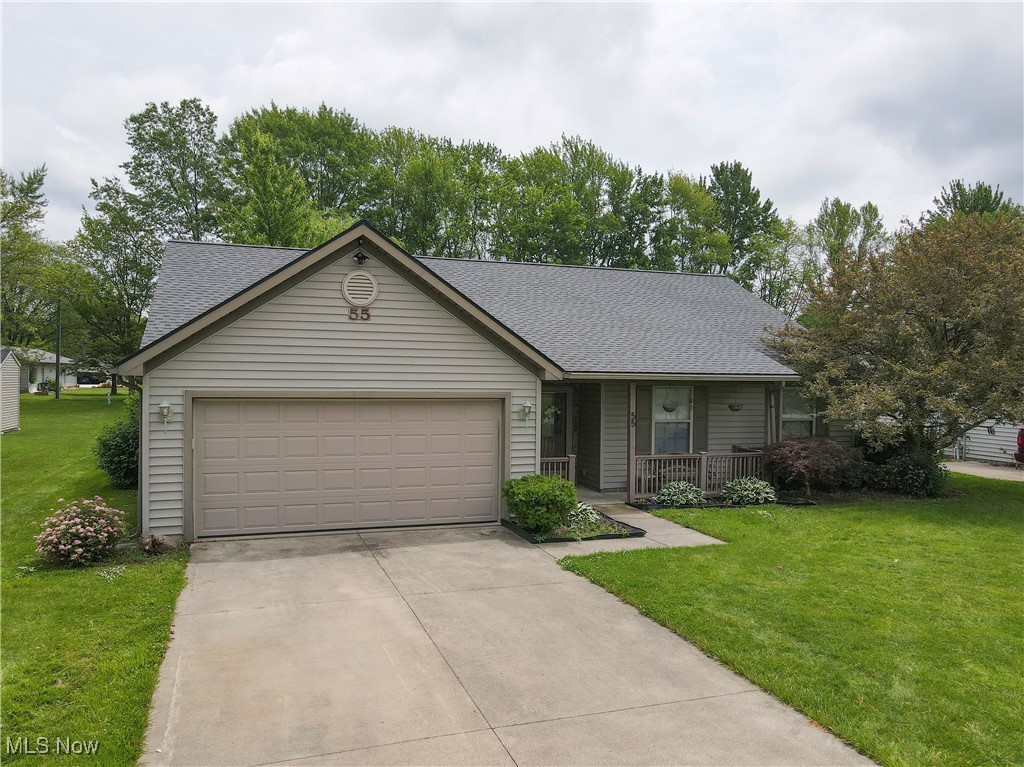 Welcome home to 55 Oberlin Rd. in charming Oberlin, Ohio! This one owner ranch, built in 1998, features 1,548 square feet of first floor living space. Pull into the attached, 2 car garage and you'll enter into the kitchen which will come fully equipped with all the appliances. Featuring brand new flooring, updated cabinets and all new hardware, you'll cook up plenty of meals and memories sitting along the bar area. The adjacent dining room features new carpet and access onto the back patio area. The living room has new carpet and a gas fireplace and offers plenty of space to entertain family and friends or to relax to your favorite show. The primary bedroom features new carpet and a large walk-in closet. The primary bath features new flooring as well as cabinet and bath/shower hardware. The additional two bedrooms feature all new carpet as well. The entire interior has been freshly painted, ceilings included. You'll find an additional two car garage in the back yard that has full electric as well as heating, making it perfect for a workshop, man cave or she shed! Updates include; all flooring and carpeting (2025), roof (2019), hot water tank (2013), fresh paint throughout interior (2025), all new cabinet hardware and sink/bath fixtures (2025) and updated outlets and light switches (2025). Contact your favorite realtor to set up a private tour!