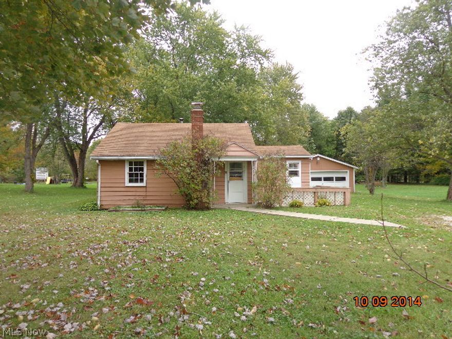 Ranch style home with updated kitchen, bath and windows. 1.44 acre lot. Vaulted ceilings in one bedroom. Bath has a skylight. Ceilings in 1 bedroom and living room are covered with rustic wood. Family room is set up for a wood burning stove. First floor laundry. The detached garage is finished with 2 rooms - has been converted to an office. There is a connection and duct work for a heater. Home is in need of paint and floor coverings. Unknown condition of the well and septic. Selling in as-is condition. No repairs. No seller paid inspections.