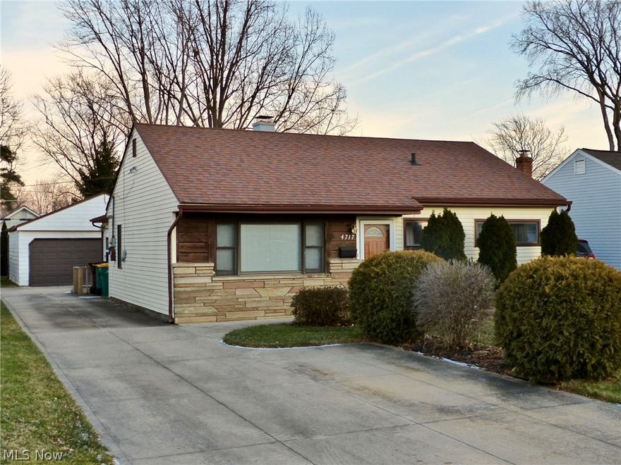 Immediate Occupancy, Vinyl and stone front ranch with extra wide driveway and 2 car detached garage, lead glass window on front door with entry to living room with laminate flooring and ceiling fan, maple kitchen (newly remodeled in 2021)with glass backsplash, quartz countertops, double SS sink and buffet serving area plus all appliances, large vaulted family room with 4 skylights, laminate flooring, brick fireplace and eating area at end near kitchen, full bath offers jetted bath tub, master bedroom offers 7' dressing area and walk in closet, tile laundry room with washer and dryer, Generator installed in 2014, brick patio, New furnace in July 2021, New Roof in 2014, 12 month home warranty. Move in Condition.