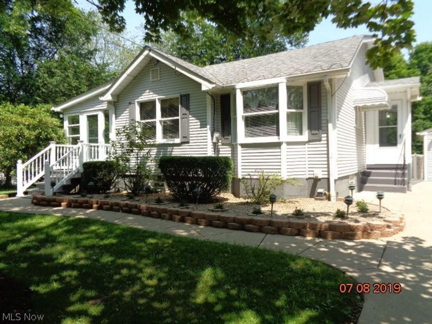 This one of a kind home is not only Move in Ready, but it's a Must See!  This 2 bedroom, 2 bath home is located on a large lot, .41 acres, with an added parcel, .64 acres.  The second parcel is a buildable lot.  Both parcels are included in one sale.  There is also a small portion of the yard that is fenced in, great for small kids or dogs.  A one car detached garage with electric opener and storage shed are also in the rear.  Gorgeous landscaping, very well maintained!  The eat in kitchen, has gorgeous maple cabinets and newer countertops as well.  A huge bay window is located in the dining area.  All appliances stay!  Nice size living room leads to a three seasons room, too cute to describe!  2 bedrooms located on main floor as well as full bath.  All carpets have been cleaned.  The full basement is dry and a walk out!  Huge space to entertain.  Possible 3rd bedroom/office/home gym, lots of storage space and a full bath as well with a stand up shower.  Glass block windows and a New f