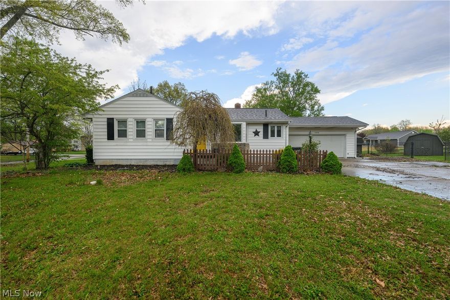 Nestled on a spacious corner lot within a serene and quiet neighborhood, this charming ranch offers the perfect blend of modern updates and cozy living. The curb appeal is immediately evident, backed by the peace of mind that comes with a brand-new roof and gutter guards installed in 2023. Inside, the home feels fresh and inviting thanks to a recently updated neutral paint palette that flows seamlessly through the main living areas and into the two comfortable bedrooms. The layout is thoughtfully designed, featuring the full bath tucked away from the entertainment flow. The heart of the home features a functional kitchen where all appliances remain for the new owner, making your move-in process effortless. Ample cabinet space and open concept entertaining means never missing a moment. Transitioning from the main level, you will find a partially finished basement that provides versatile extra space for a home office, gym, or recreation room. A shower and sink are included, while only missing a toilet, to call this a full bathroom. Outdoor enthusiasts and entertainers will fall in love with the fully fenced-in backyard, which serves as a private oasis. The expansive back deck is ready-made for summer gatherings and weekend barbecues. Storage is never an issue here, as the property includes a two-car garage and two additional sheds to house all your tools and hobby gear. This meticulously maintained home on its quiet corner is truly a rare find that combines essential updates with a peaceful location. Significant mechanical upgrades ensure year-round comfort and efficiency, including a brand-new hot water tank installed in 2024, central air from 2018, and a furnace from 2015.