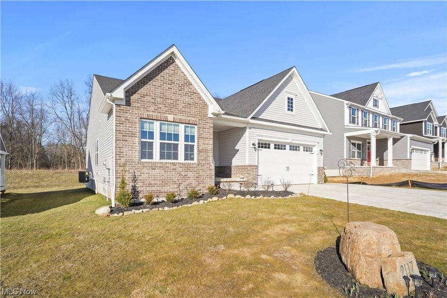 Why wait for a new build, when you've found this sprawling ranch with virtually every upgrade! Welcome home to this Bramante model ranch home located in the Field School District! Walking in you will love the mudroom with built-in storage, the perfect place for everyone to drop off their things! Moving along you will be amazed when you set foot into this gorgeous open floorplan which features a large open kitchen with granite countertops, under cabinet lighting, stainless steel appliances including a double oven, eat in kitchen for a sit-down meal, breakfast bar for meals on the go and views into the spacious living room! Most of your time may be spent next to the gas fireplace in the living room that features an abundance of natural light! The main bedroom is large, well-lit and private! It features a tray style ceiling and access into a full private bathroom with gorgeous ceramic tile, a double vanity, tiled roman shower and a large walk-in closet and first floor laundry just off the main suite. Down the hall you will love the home office with upgraded French doors for those moments when you need privacy! The main level also features another bedroom with a full bathroom wrapped in ceramic flooring and new age finishes! The lower level is home to a huge finished area, perfect for family evenings watching movies or playing games! You will also find an additional bedroom with an egress window and yet another full bathroom! A large utility room will be the perfect fix for all your storage needs! The exterior of this Bramante ranch features a new concrete patio with costs of around 10k, a driveway kickout for extra parking, a $5800 shed for lawn equipment and plenty of flowering bulbs! The garage also features an electric plug for electric vehicles! No expense was spared in this amazing ranch! Book your private tour today!