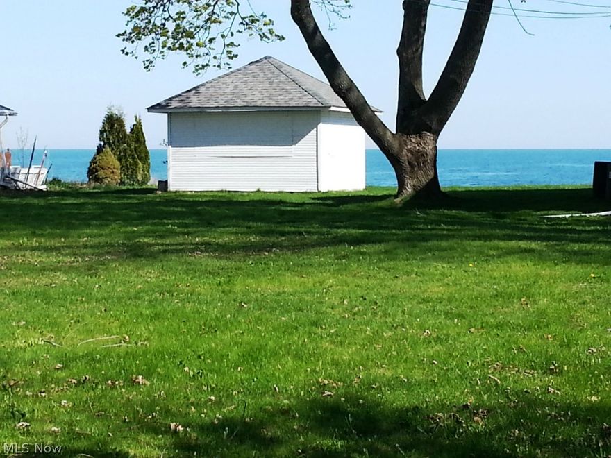 Lakefront buildable lot available separately or may be bought with home at 2531 East Erie Ave (MLS# 3697177). Property has a small beach house without utilities on it at the moment. Contact lister with any questions. See attached survey for more details. Those who wish to view the property may park at 2531 East Erie Ave to walk the lot.