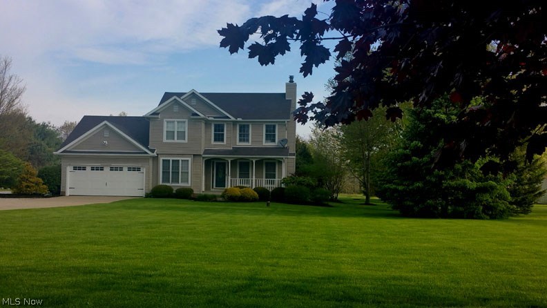 Fantastic 3 Bedroom, 2.5 Bathroom, 2 story colonial sitting on a gorgeous 5 acre lot! Perfect location. Private yard with pond, mature trees and stunning landscaping. Enjoy hard wood flooring throughout the first floor. Ceramic tile in the half bath and laundry room/mud room. Great room with beautiful brick fireplace with wood burning insert. Kitchen includes all stainless steel appliances! Master bedroom has private bathroom and his and her walk in closets. Plenty of storage throughout. Two car attached garage with additional 28x48 (3 car plus) building with heat, water and electric. Rear partially covered deck is perfect for entertaining or just enjoying the quiet beauty of the country. Field School District / Suffield Elementary. This is a USDA Loan eligible property. It won't last at the price! Schedule your showing today.