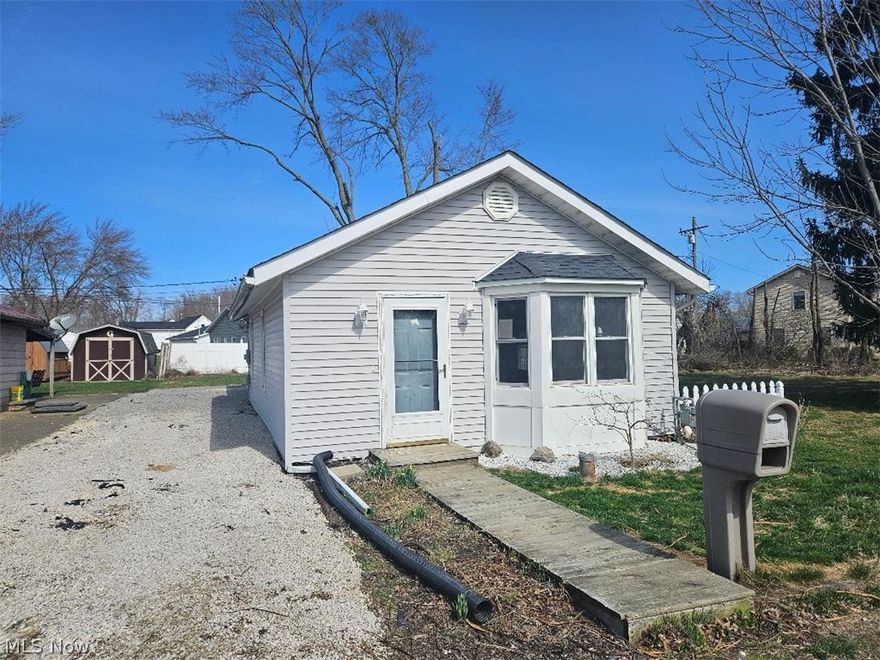 Great opportunity in Westville Lake Community.  Whether for your weekend retreat, summer season enjoyment or all year living. Affordable 2 bedroom ranch with gorgeous lake view directly opposite the property. Property consists of three total parcels.  First floor laundry - stackable washer and dryer convey.  Appliances are not warranted.  Home appears livable in its as-is sale condition.  Room sizes and taxes are estimated. Buyer or Buyer Agent to verify all information. City of Beloit owns the Lake