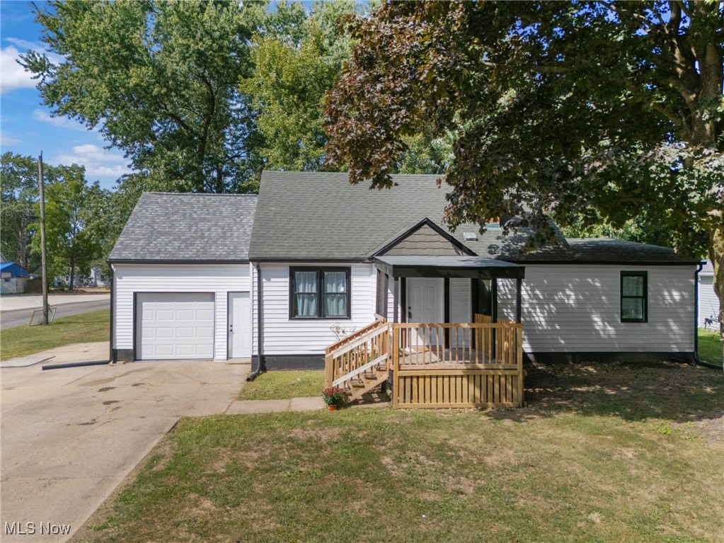 Welcome home to this 3-bed, 2-bath home on a double corner lot in Red Rider territory. This home has been extensively and recently updated, combining modern amenities with classic comfort. The interior feels brand new with fresh paint and new flooring throughout. The kitchen, the heart of the home, has been fully revitalized with beautiful new butcher block countertops, a new sink and faucet, and a full suite of new appliances. The dining room offers peace and tranquility as it overlooks the new back deck and yard. The living room features plenty of natural light and a wood burning fireplace. The front door opens to a covered porch for additional outdoor space. There is a newly renovated bathroom on the main level and two bedrooms complete this floor. Upstairs, there is a third bedroom or flex space for a home office, playroom, or hobby room. A major addition is the brand-new full bathroom in the basement, adding convenience and value. The basement is also upgraded with new, secure glass block windows, basement waterproofing, and a sump pump. The space is ready for finishing. Exterior improvements including new siding and gutters enhance curb appeal. Enjoy outdoor living on the new deck, equipped with safety rails for added peace of mind. The property also includes a new garage roof and a new garage door with an opener (2025). This is a fantastic opportunity to own a move-in-ready home with many major updates already in place.