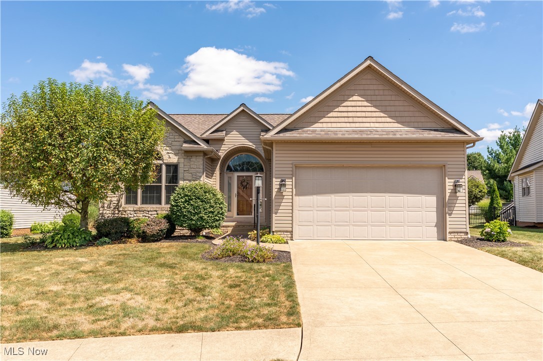 This charming ranch-style home offers a perfect blend of comfort and style with three bedrooms and two full bathrooms. The inviting great room features 10-foot ceilings, hardwood floors, and an elegant pillared entryway, all accented by crisp white trim and a cozy gas fireplace. The open layout flows seamlessly into the large eat-in kitchen, complete with a breakfast bar, granite countertops, stainless steel appliances, hickory cabinets, and a stylish tiled backsplash. Adjacent to the kitchen is a formal dining room, ideal for entertaining. The large primary suite is a true retreat, boasting a private bath with a separate jetted tub, shower, dual sinks with a granite vanity, and a generous walk-in closet. Two additional bedrooms provide ample space, with the third bedroom offering the flexibility to be used as an office. A second full bathroom completes the layout. The home’s thoughtful design includes a convenient split-bedroom layout, ensuring privacy. A first-floor laundry area is located just off the garage for added convenience. Outside, the backyard has a composite deck, perfect for relaxing or hosting guests. The large unfinished basement is ready for your customization, featuring plumbing for an additional bath, glass block windows, and a radon mitigation system. The HVAC was replaced in 2023, and the roof was replaced in March 2023. Originally built as a free-standing villa, the HOA was disbanded and integrated into the neighborhood HOA years ago.