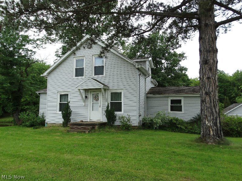 3 Bedroom home on 4.41 Acres, 2 tiered deck to enjoy, sun room. Conveniently located close to I 90. Wonderful stocked pond with covered bridge to get to the island. 5 Car detached garage (3 bays have heat and air conditioning.)