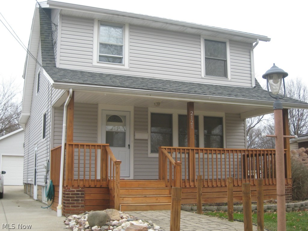 Wow! Welcome to this beautiful, move in ready colonial with charming front porch. Great room addition with cathedral ceiling opens to remodeled kitchen with all appliances and black granite counter tops. Formal living and dining rooms add to living space. Step out back onto the deck which extends across the back of the house. All wood trim and laminate floors. Updated baths, windows, roof, furnace, air and electric. Concrete drive and oversized 2 car garage.