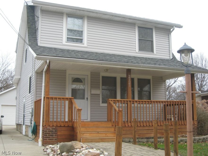 Wow!  Welcome to this beautiful, move in ready colonial with charming front porch. Great room addition with cathedral ceiling opens to remodeled kitchen with all appliances and black granite counter tops.  Formal living and dining rooms add to living space. Step out back onto the deck which extends across the back of the house. All wood trim and laminate floors.  Updated baths, windows, roof, furnace, air and electric.  Concrete drive and oversized 2 car garage.