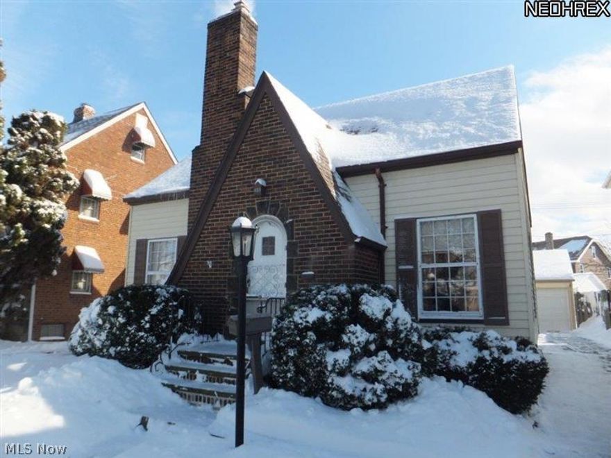 Beautiful well-kept home inside and out! Custom built kitchen with all appliances (refrigerator, stove, oven, dishwasher, microwave); Large formal dining room that opens up nicely to the cozy living room; magnificant hardwood floors throughout; vinyl replacement windows upstairs; central air; enclosed porch; 2 car garage; beautifully landscaped yard. This home is located on a quiet tree-lined street, and is convenient to many amenities, the highway and the lake.