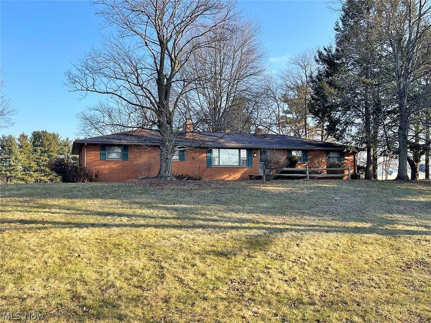 Three-bedroom brick ranch home on a nice 2.48-acre lot. Features include a spacious two-car garage, an eat-in kitchen (ready for renovation) with stainless steel appliances to remain, a front living room with a wood-burning fireplace insert, hardwood floors, a large main-level bathroom (ready for renovation), and three bedrooms with hardwood flooring; one bedroom is plumbed for main-level laundry. The partially finished basement has a large family room or office. There is a full shower bath and a large utility storage room. The property has well water with a Pure Aqua softener and a whole-home filtration system. Enjoy a nice lot in a convenient location! Located in Brown Twp., with no zoning. Gas and oil rights do not transfer.