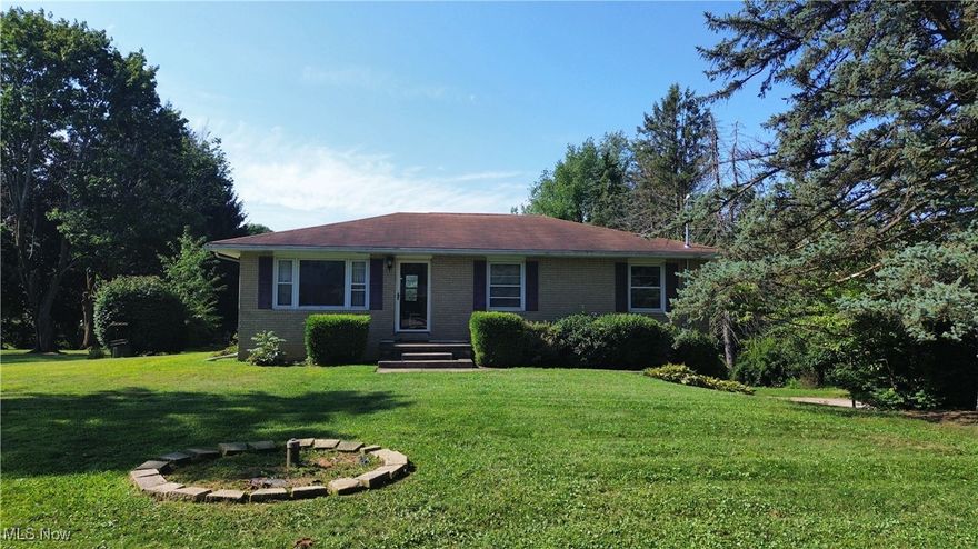 Charming raised ranch on quiet dead-end street!  Welcome to this adorable raised ranch nestled on a peaceful dead-end street-less traffic means more privacy and tranquility!! Step inside to find beautiful hardwood floors flowing through the spacious living room and continuing down the hallway into all three generously sized bedrooms. The two-car garage is connected to the central HVAC system and opens into a versatile basement recreation room, which can easily be transformed into a fourth bedroom or home office.  From the garage, step out onto a lovely stamped concrete patio-perfect for relaxing or entertaining guests. A 768 sf outbuilding adds additional parking, or flexibility for a workshop, studio, or additional storage. Located in a quiet, friendly neighborhood, this home offers the peace and comfort you've been looking for.