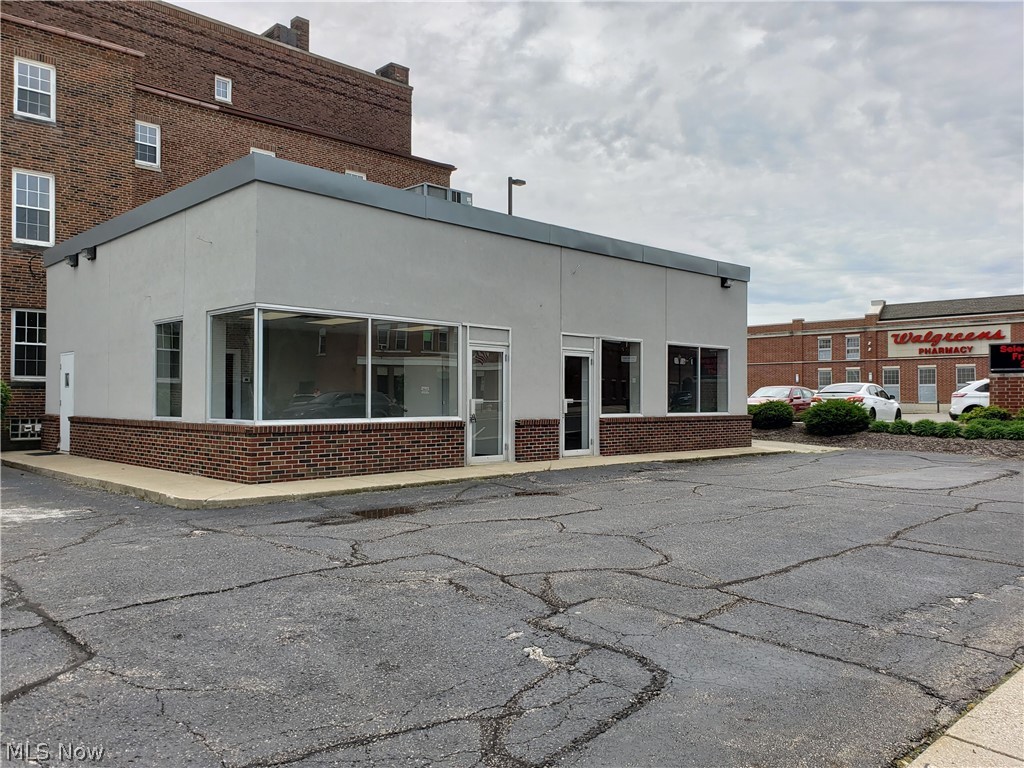 For lease or sale. Centrally located Ravenna building suitable for office or retail use. CBD zoning allows for a variety of uses. Building recently renovated including a new roof, HVAC, siding, carpet, paint, etc. Neighbors include Walgreens, Domino's, Taco Bell and CVS.