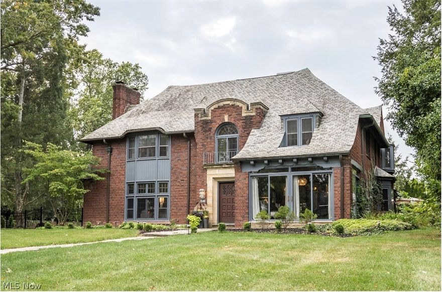 This spot between Portage Path and Merriman Road is, without a doubt, one of Akron's most sought after neighborhoods. It's easy to see why with the distinguished and diverse architecture, and close proximity to downtown and freeway access. In this case though, the location might come in a close second to the spectacular interior design. The recently renovated kitchen features an oversized island with waterfall edge counter, fancy new stainless steel appliances, wine fridge, and expansive window allowing a ton of natural light in. The attention to detail continues through the rest of the house into the gorgeous master suite with attached bath. The current owner converted an adjoining bedroom into a sizable walk in closet, and private laundry area. Don't worry, if you need the fifth bedroom, it's easy to convert back. There are a few more updates to take note of, the electrical has been completely redone, the lower level has been partially gutted and made usable space to gather, and the