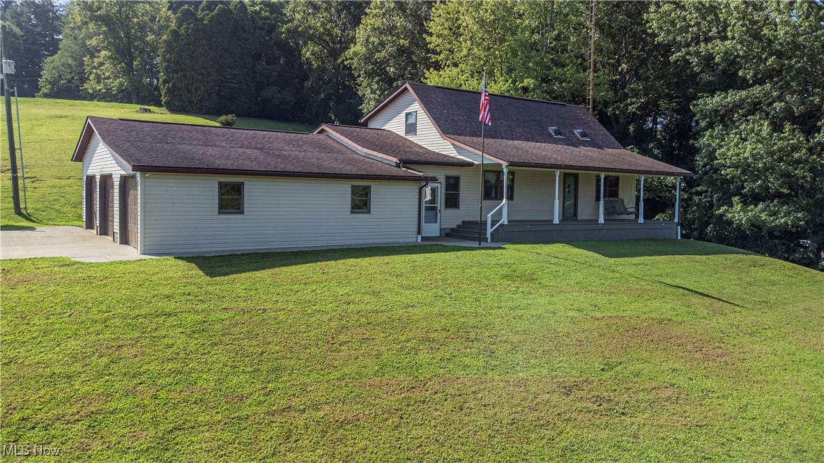 Move-in ready 3-bedroom, 2-bath home in Tri-Valley Schools on 3.13 acres with a 3-car attached garage! Featuring quality Amish finishes throughout, this home blends exceptional craftsmanship with modern comfort. The main floor offers first-floor laundry, two bedrooms, and a full bath. Upstairs, enjoy a loft, second full bath, and a private third bedroom—perfect for guests or a home office. New furnace in 2024. Relax on the covered front porch or take advantage of the oversized garage for storage and parking. Just 13 miles to Newark, 35 to New Albany, and 53 to Columbus—quiet country living with city convenience!