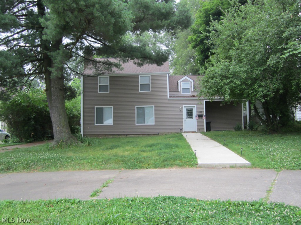Beautifully remodeled, like new in 2013. Open and light-filled floor plan. Dream kitchen with dark cabinets, granite, stainless. Ceramic floors in kitchen and baths; new carpet elsewhere. New bathrooms. Large family room. Spacious, charming bedrooms with lots of closets and built-ins. First-floor laundry. Circular front drive. Detached Garage. Newer roof, furnace, water heater, central air.