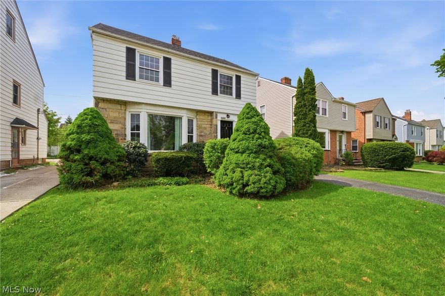 This spacious three-bedroom, 1.5-bath Colonial is located in the heart of University Heights. The main level features hardwood flooring throughout the living room and dining room, leading into an oversized, bright den equipped with spotlights and built-in cabinets. The kitchen includes extra cabinet and counter space along with two sinks, positioned next to a functional work or homework nook that connects the kitchen and den. Upstairs houses all three bedrooms and an updated full bathroom. The finished basement provides additional living and entertainment space.