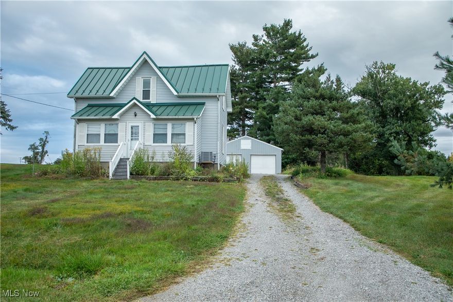 This single-family home sits on just over an acre on the outskirts of Barnesville, Ohio, offering plenty of space and privacy for practical, everyday living and yet close to all the amenities that Barnesville has to offer. The main floor includes a kitchen with laundry hookups, a living room, a sunroom, and a full bathroom. Upstairs, there are three bedrooms - one of which is a captured bedroom - along with a second full bathroom. The property also features a detached garage that can be used for parking, storage, or a workshop.