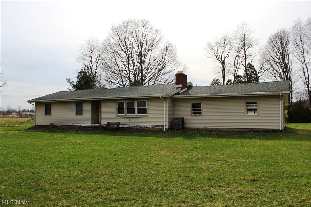 Everything you are looking for in a property is here. The home is a 3 bedroom 1.5 bath ranch. Some newer carpeting and original hardwood floors. Large living room with wood burning fire place and several windows that let in lots of natural light. A full basement also has a fire place and offers a large open space that could easily be finished for a great rec room. Finally, there is a 2 car oversized garage and an enclosed back porch. The 11+ acre lot on 2 parcels has a pond and is mostly open field. The highlight of the property is the stand-alone pole building. With over 2,800 sq. ft., a majority of the building is clear span and open. Perfect for any kind of business. A small room houses the boiler for the radiant heating system that provides heated concrete floors. With 2 overhead 11 x 13 doors on one side and another 16 x 13 at the other end of the building, the building provides convenient drive through capabilities. Great business investment and rent the home for supplemental income. The possibilities with this property are up to your imagination.
