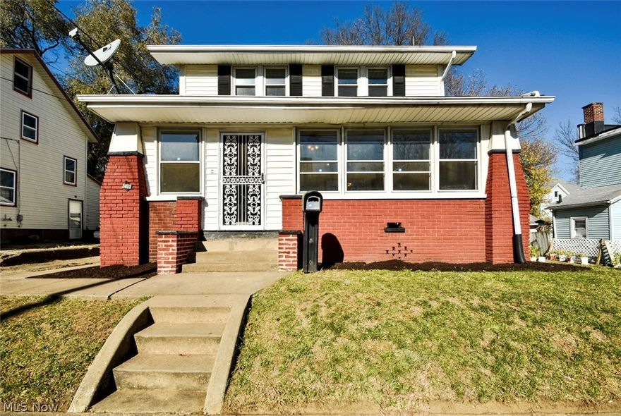 Very large updated Two Story. Updated kitchen & bathroom. New flooring on first floor. Newly painted throughout. First floor has living room with possible family room/office. Large enclosed front porch, shed, glass block windows, lots of built-ins for storage. Nothing to do, but move in.  Call me regarding down payment assistance and closing cost assistance through Canton City - convenient location - bathroom has been updated