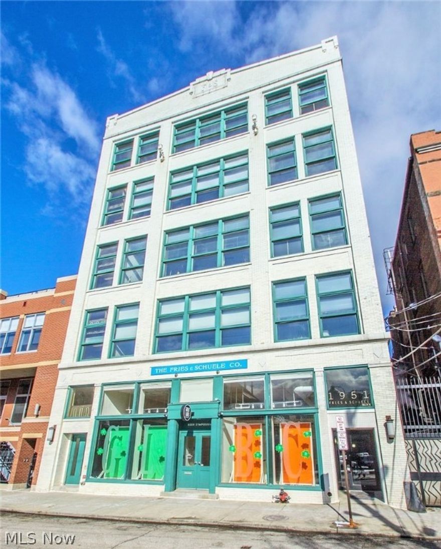 Bright and spacious top floor 2 bedroom 2 full bath Fries & Schuele suite in the highly sought after Market Square of Ohio City. Fresh decor, original hardwood floors, soaring great-room ceilings, and exposed duct-work are just a few of the features that this historic landmark has become known for. The living room dazzles with a full wall of floor to ceiling windows and french door that leads to the private balcony overlooking the courtyard. Back inside find the large open kitchen with all stainless steel appliances, granite counters, and breakfast bar island. The master bedroom offers an on-suite full bath. Across the hall find the second bedroom perfect for a guest room or office. There is also an additional full guest bath. Enjoy the convenience of in-suite laundry as well as in-building amenities including a 24hr fitness room private storage room, and private courtyard. This location is everything, Market Square is home to some of the city's best restaurants and breweries and the W