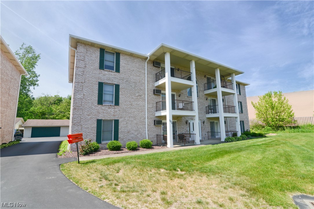 Desirable first floor...no steps. Entire condo freshly painted. Nicely updated throughout with 1/2 bath in the large master bedroom with walk in closet. Main bath has new vanity/faucet/shower head; wonderful walk in shower. Kitchen had old cupboards and bar removed and replaced with new Farmhouse Island and stools. Also removed old stove hood/vent and installed microwave with carpenter made new oak shelf; also new faucet, all cabinet pulls, blinds and garbage disposal. Dining Room has new laminate wood floor, light fixture and fan; both entryways to living room also have new laminate wood flooring. Large pantry and more storage in the garage! Water/ dryer in your unit. Bright and open kitchen/dining. Large shared garage with opener. Move in ready, relax and enjoy the condo life