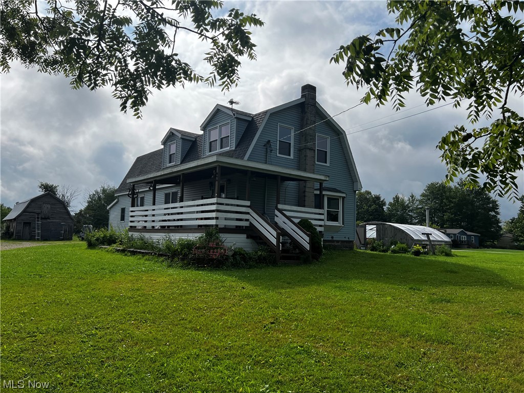 This farm has so much to offer. 2 parcels equaling 39.99 acres with approx 7 acres woods and around 2 acres fenced for pasture. 5 Bedrooms (1 being used as the laundry room currently), 1 1/2 bathrooms. Bamboo wood flooring and pellet stove in living room. Hickory Craftmaid cabinets in large open kitchen. 2 bedrooms downstairs, 3 upstairs, some with hardwood floors. Outbuildings include a detached garage with electric, block barn with 2 stalls, electric, water and milk house. 30X32 pole barn attached to block barn, has electric, 24X40 shop with 220 electric and insulated, approx. 18X20 barn with electric and water, 24X48 tool shed, and a granary. Plus 2 greenhouses, one with heated beds and water. Pear and mulberry trees and a small pond. Outside wood furnace heats the home. Original home built in 1937, addition added later and upstairs added in 1992.