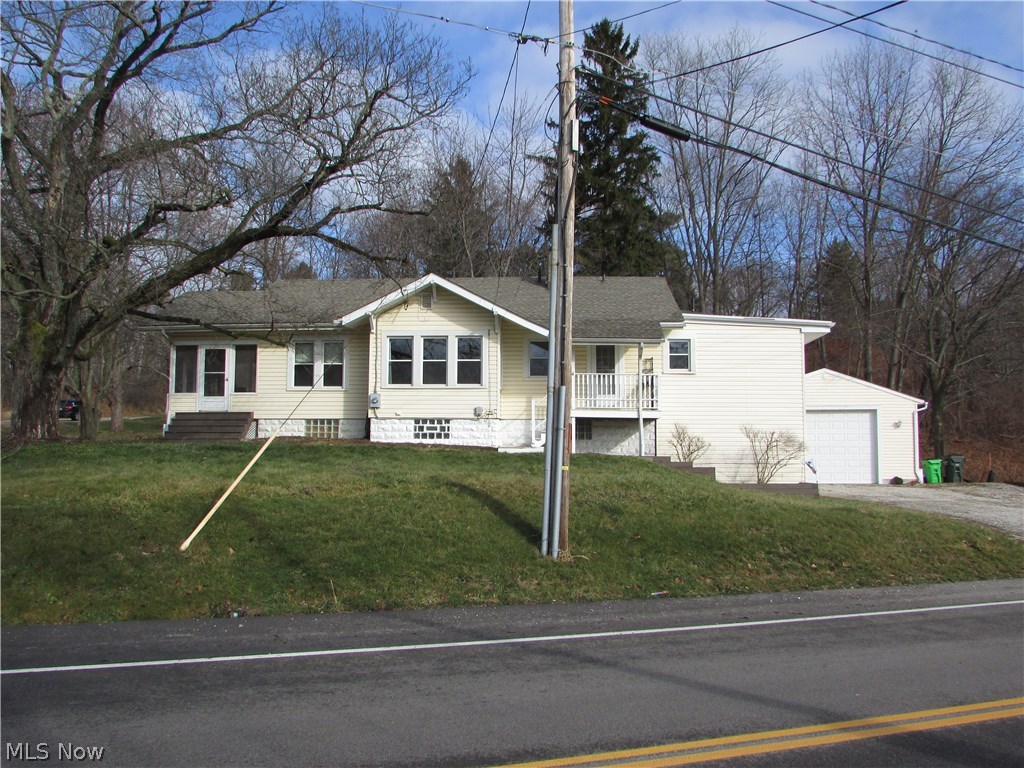 A remarkable 3, possible 4, bedroom ranch with a finished walk out basement. Sitting on 3/4 acres, this lovely home features a master suite that walks out to the deck. The galley kitchen opens to a huge formal dining room. The formal living room has wood floors, and opens to a screened porch. The basement has a 22x11 rec/family room, as well as an office or 4th bedroom. A 24x20 2 heated garage has a 10 foot door. An attached shed, huge laundry room, plenty of storage, partially fenced yard, and so much more. Possible Lease Option!