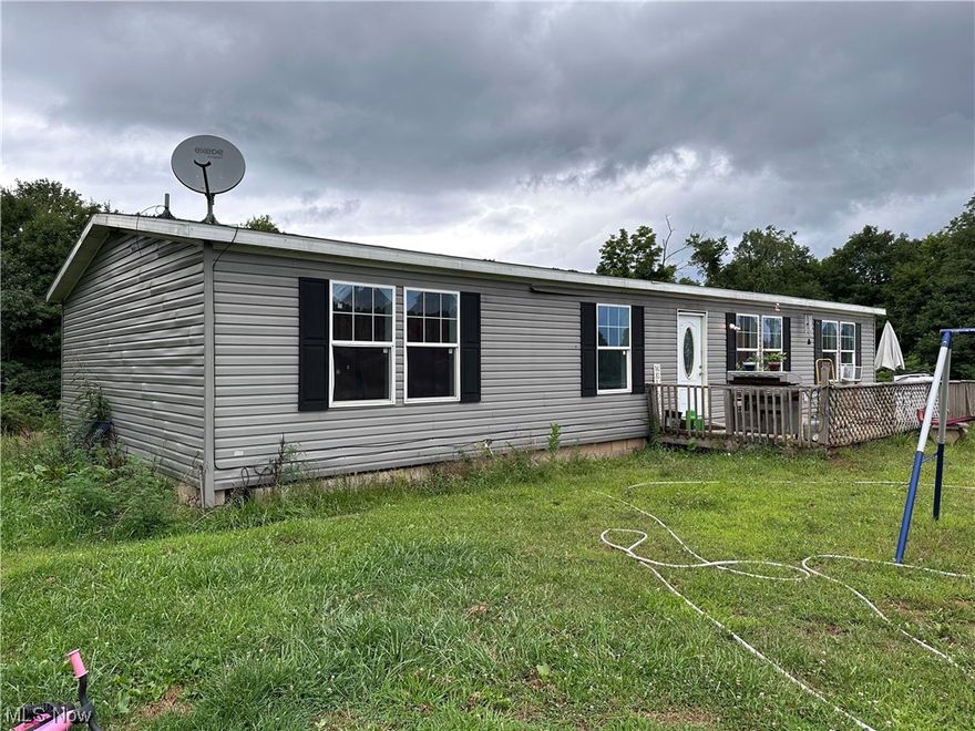5 Acres - One Floor Living - Peace & Quiet - This quiet country setting home is the perfect setting for this 4BR/2BA country home on 5 acres with an Open floor plan. Needs TLC but has the potential to be amazing!  With a total of 5  Acres, there is room for livestock, hunting, and seclusion.