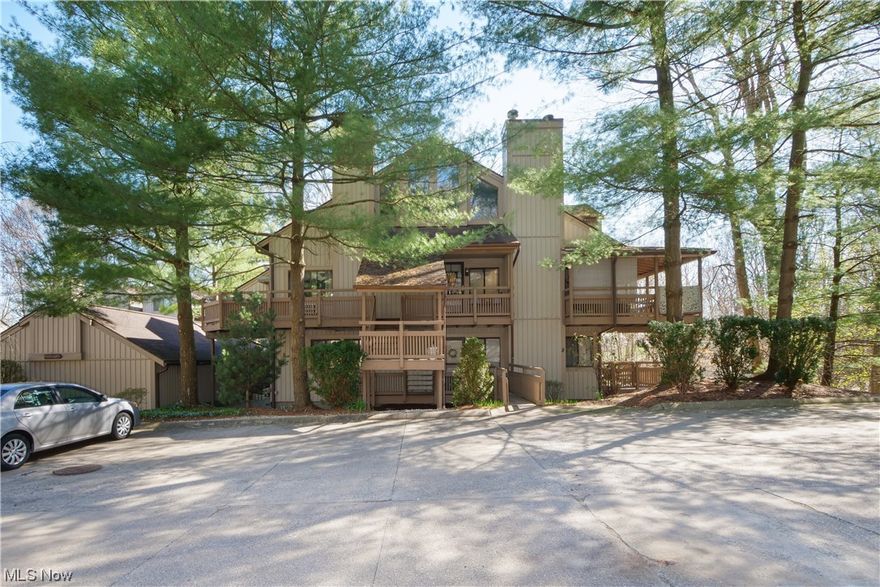 Welcome home to your peaceful escape in the highly desirable Pine Mill Ridge Community:  This 1 bedroom, 1.5 bathroom condominium is hidden away from the main road and surrounded by trees.  Upon entering the home you will be wowed by the spacious, open floor plan with the large windows in every room that let in an abundance natural light throughout.  The entry foyer opens into a living area that flows to the dining room with a breakfast bar.  The woodwork and solid oak kitchen cabinets have been recently stained to accent the neutral paint throughout the home.  There is a large food and storage pantry just off the kitchen, and the laundry area can accommodate a full size washer and dryer.  You can warm up on cooler evenings at your field stone fireplace as you look out on beautiful treed views.  The upper level features a bedroom with spacious closets, a loft area, full bath, and vaulted ceilings with exposed beams and skylights.  This home has an amazing amount of additional storage a