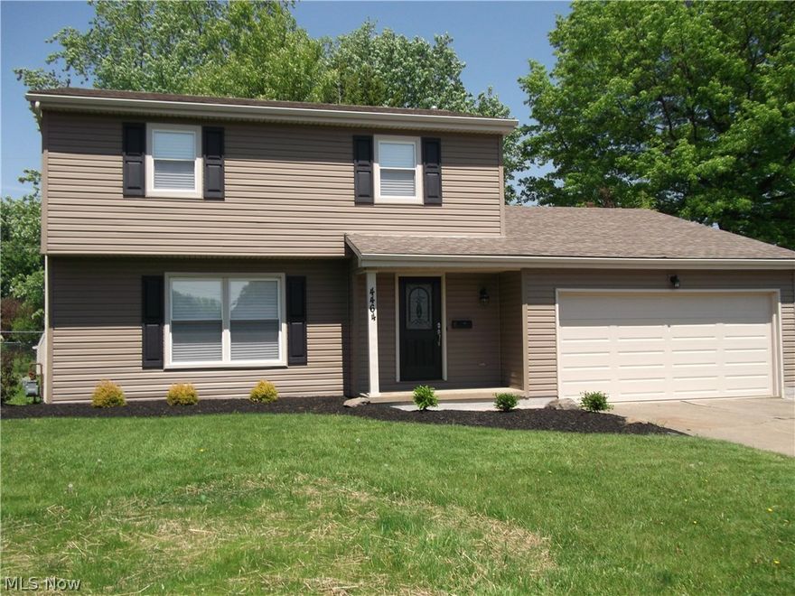 Gorgeous Newly renovated 3 bedroom 2 bath two story with newly finished basement! Stunning new soft close kitchen cabinets with breakfast bar island and granite countertops! Beautifully remodeled baths, all new interior exterior lighting, satin nickel hardware finishes, carpeting, and freshly painted throughout. Brand new garage door, newly landscaped, new hot water tank, newer 95% efficient furnace, a/c, 3 D roof shingles, vinyl siding, and vinyl replacement windows. Wow! Start packing!