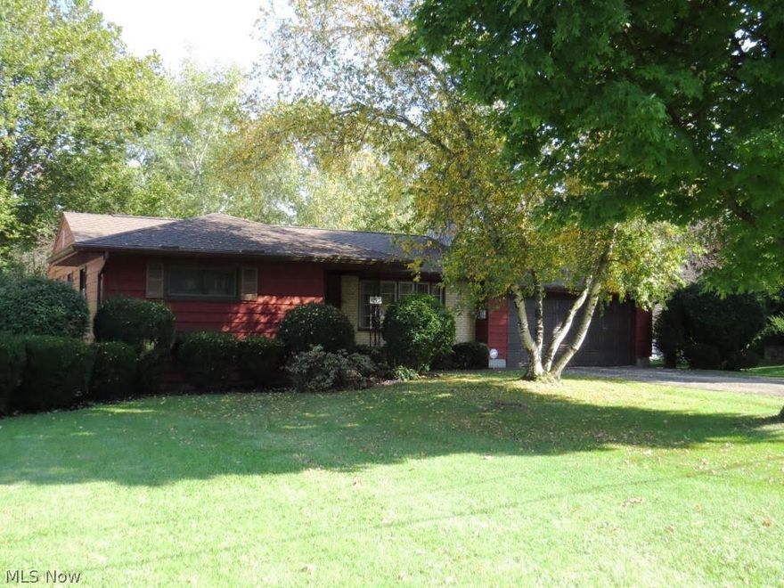 Beautifully updated ranch home on a large, park like lot.  Home features a new roof in '15, blown in insulation in exterior walls and attic, newer windows, newer Trane high efficiency furnace & central air, including air purifier.  The full basement walks out to a large patio.  Home has a gorgeous hardwood floors, a new cooktop & range hood, and a 2.5 car garage.  Enjoy a cozy winter night by your wood burning fireplace.