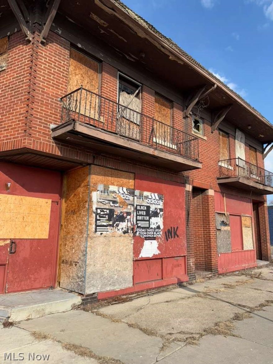 Solid brick building but needs everything inside!!!.  2 storefronts, 3 apartments.   Could be really nice income producing building for those seasoned investors ready for a challenge.