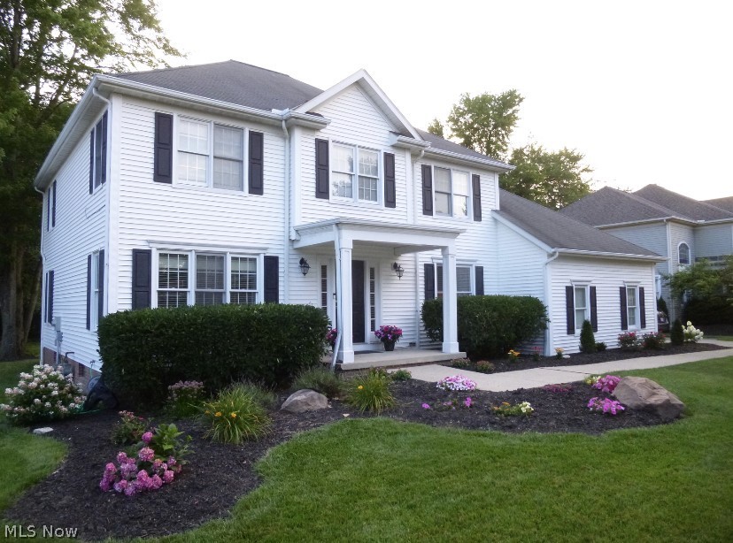 Beautiful colonial with 4 bedrooms and 3.5 baths is located in highly desirable Hawthorn of Aurora which offers boating and skiing on private lake, swimming pool, tennis courts, pavilion and clubhouse and is in the award winning Aurora school district. This move-in ready home has fresh neutral décor; immaculate wooden floors with an open floor plan. The first floor includes an office/den, living room, formal dining room and a half bath with granite countertop. Kitchen has maple cabinets, granite countertops, stainless steel appliances and is open to the dining area and family room with cove ceiling and a fireplace. There is a sliding glass door in the dining area which opens to a large deck with two privacy fences that overlooks a big backyard. Large master suite with cove ceiling, walk in closet and ensuite bath with two vanities with granite countertops, jetted soaking tub, shower, skylight and a soaring 16 feet high vaulted ceiling. 2nd bedroom also has an ensuite full bath. 3rd bed