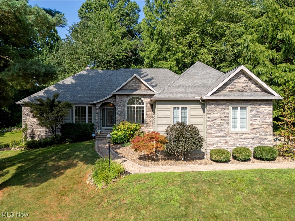 Welcome to this beautifully appointed 4-bedroom, 3.5-bath ranch nestled in the highly sought-after community of Miller Lakes in the heart of Wooster. Ideally located near the Wooster Country Club, The College of Wooster, and just minutes from downtown shopping, dining, and north-end amenities. This home offers both luxury and convenience. Step inside to discover a spacious, thoughtfully designed layout featuring a first-floor owner's suite complete with a spa-like en suite bath--soaking tub, tiled shower, and walk-in closet included. Two additional bedrooms share a Jack & Jill bath, while a formal living room and dining room provide elegant spaces for entertaining. The light-filled kitchen is a chef's dream with a breakfast nook, butler's pantry, and adjacent great room featuring soaring cathedral ceilings, a cozy wood-burning fireplace, and a wet bar--perfect for gatherings. A half bath and a first-floor laundry room add to the convenience. The finished lower level offers a large recreation room with built-in desk for a home office, a fourth bedroom, full bath, and an additional flex room to suit your needs--ideal for a gym, media room, or hobby space. Step outside to your private backyard retreat with a deck, patio, and koi pond nestled in a wooded setting for ultimate privacy. The 3-car garage features epoxy floors, and the back-up generator ensures peace of mind during power outages. Take a peaceful stroll around the lakes and enjoy the beauty of nature--including the swans that call it home. This is a rare opportunity to own a refined home in an exceptional setting--schedule your private tour today!