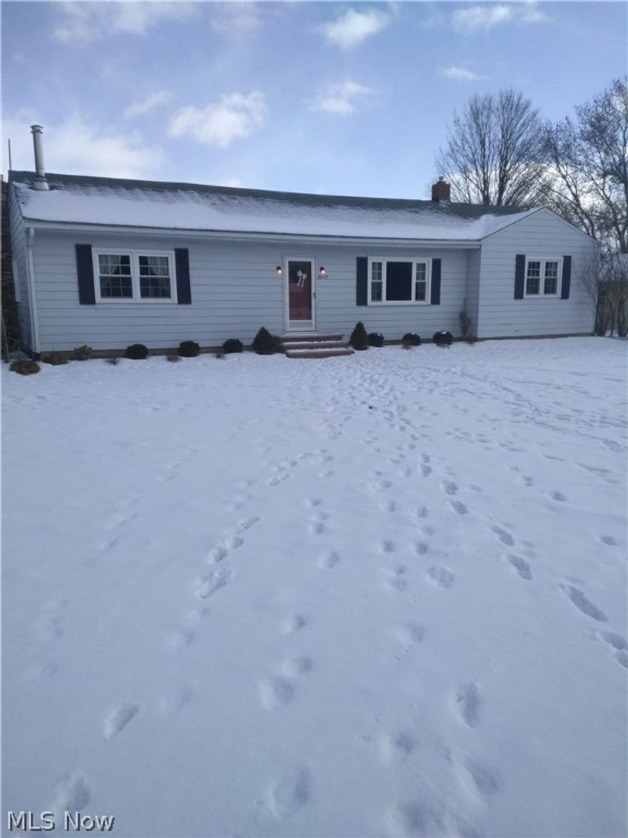 Sprawling remodeled ranch in the country! 5+ acres, (3 wooded). Open floor plan features living room, family room (ready for wood stove), unfinished full basement with loads of potential and a 30x30 pole barn with loft and tin roof. Sit on the deck and enjoy nature. Call to schedule a private tour!