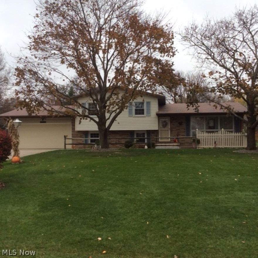 Welcome to 2534 McDowell St NE, centrally located in Holly Hills in Plain Local. This is a charming, clean one owner split level home with much to offer.
The home features a nice size  updated kitchen with " reverse osmosis "water. A nice nice dinette area to compliment as well. From there you look down to the family room with fireplace and exterior door to the attached garage. Another nice feature is the "3 season room" or (Sunroom) with an adjacent large wood deck as well.  Enjoy the spacious lot, close to 1/2 acre with a nice shed for storage and plenty of room to grow a garden. Back inside to upper level with a full bath,master bath and 3 nice size bedrooms. As we return to the lower level you will see a neat basement with 2 sub-pumps that make for a dry basement. Furnace is approximately 5 years old , newer hot water as well. Water is naturally soft as a result the eliminators function helps to remove the iron from the water!. Newer concrete driveway with Central Air and much mor