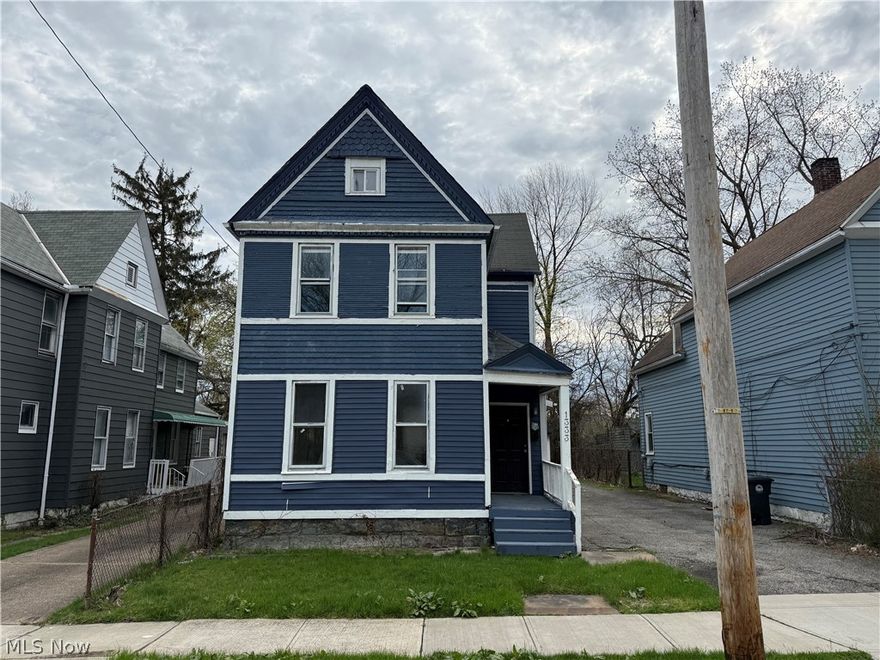 This income-producing multifamily offers three separate rentable spaces with strong cash-flow potential and value-add upside. The first-floor unit mirrors the second-floor layout with 2 bedrooms, 1 full bath, oversized living room, and large kitchen, with light cosmetic improvements needed after the recent tenant move-out, giving the next owner a clear opportunity to increase rents through minor updates. The second-floor unit is in solid condition and offers 2 bedrooms, 1 full bath, a spacious living room, large kitchen, carpeted living areas, and its own dedicated furnace for separate temperature control. The third-floor studio suite is a standout feature, complete with a small kitchen, full bathroom, and electric heat, making it an ideal affordable rental for a tenant seeking a simple, low-maintenance living setup with predictable utility costs.Additional exterior features include wood and vinyl siding, a welcoming front porch and side porch, asphalt driveway, on-street and off-street parking, a detached 2-car garage, partially fenced backyard, and grassy area next to the garage. The basement is equipped with two hot water tanks, two electric panels, and a dedicated furnace for the first floor, while the third-floor studio is heated by electric baseboard heat. Located near major hospitals, museums, public transit, downtown Cleveland access, and one of the strongest rental demand corridors on the east side, this property is an excellent opportunity for an investor looking for multiple income streams, strong tenant demand, and long-term appreciation at an attractive price point.
