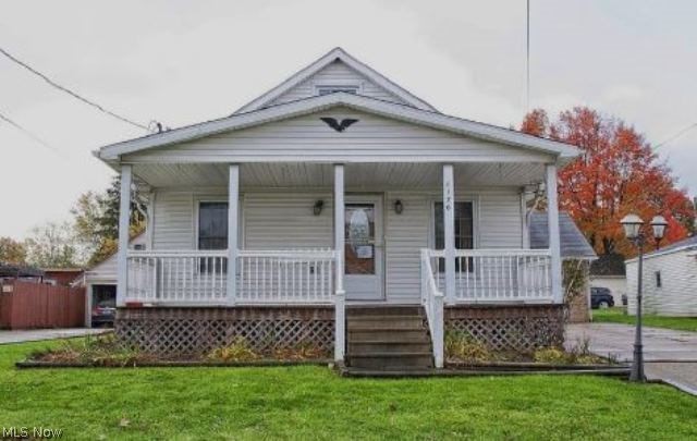 Here is your chance to buy this one and a half story home located in Barberton ,OH and sitting on approximately .13 acre lot with a concrete driveway, detached 2 car garage and an in ground pool in the fenced back yard. The interior offers approximately 1382 sq. ft. with 3 bedrooms, 1.5 bathrooms plus a unfinished basement. 2 parcels included.