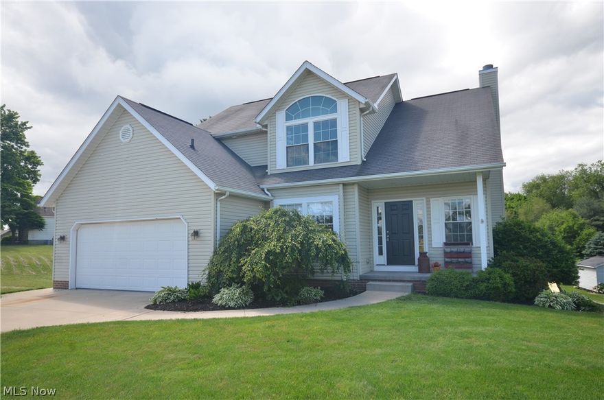 This wonderful home in the Village of Hartville is ready for you!!  Featuring 3 Beds, 2 Full and 2 Half Baths, 2 Car Garage, a Walk Out Finished Rec Room and so much more.  Entering the home into the open Foyer you are flanked by a Cubby Area perfect for guests shoes and coats on one side and the Dining Room on the other.  Continuing straight ahead you come to the large Family Room with a Gas Fireplace that is wide open to the renovated Kitchen featuring all Appliances and a fantastic Island Area.  Rounding out the 1st Floor are both a Half Bath along with a nice Laundry Room.  Upstairs you will find all 3 Bedrooms and 2 Full Baths - the Master Bedroom is very large and has an en suite bathroom.  The Walk Out Basement is set up nicely with over 500 sq feet of Finished Rec Room, another Half Bath and still offers some storage areas.  Outside in the Backyard you have options to relax on the elevated Deck or the Patio off the Basement below.  Some updates completed in the last 5 years inc