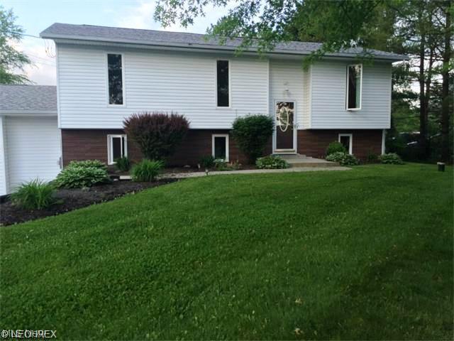 Rare find! 4 bedroom home with oversized 2 car garage, deck + patio, and huge yard! This gem has been absolutely updated from top to bottom. Major updates include: kitchen, both bathrooms, roof, central air, siding, windows, electric panel, carpeting/paint, well equipment, and hot water tank! Tastefully decorated throughout, you will fall in love with the spacious kitchen (matching stainless appliances included!) w/ample counter/cabinet space, and dining area w/ceramic flooring. The floor plan boasts both a formal living room, and family room complete with wood burning stove, as well as a separate rec or play room! Even the laundry room is bright and airy! This home has so much to offer and so little to do you will have to see it to believe it! Possible 0% down financing!