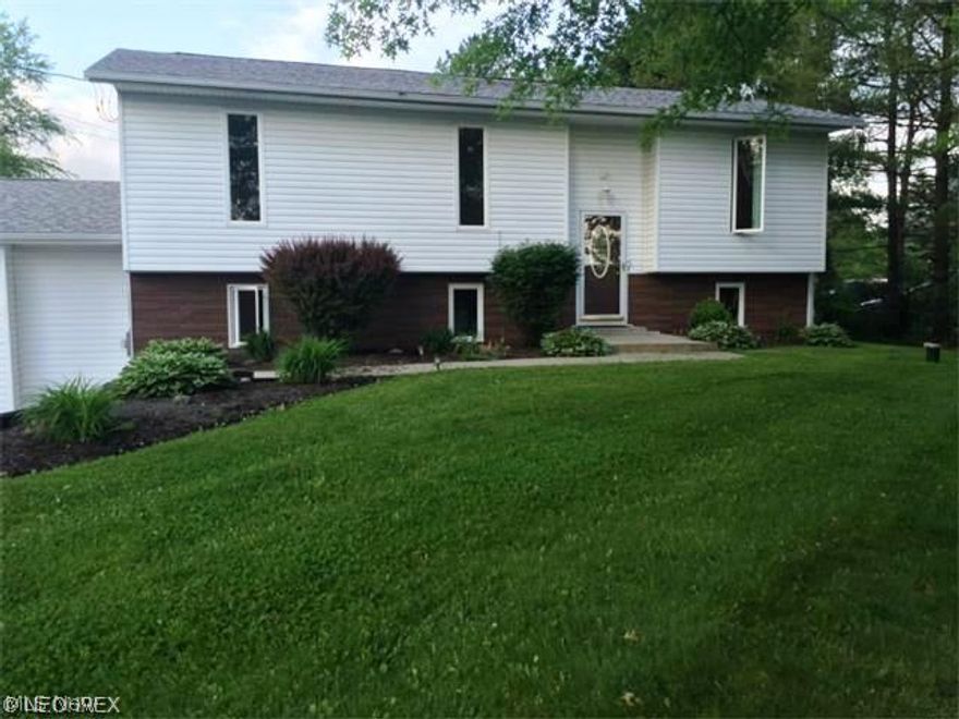 Rare find!  4 bedroom home with oversized 2 car garage, deck + patio, and huge yard! This gem has been absolutely updated from top to bottom. Major updates include: kitchen, both bathrooms, roof, central air, siding, windows, electric panel, carpeting/paint, well equipment, and hot water tank! Tastefully decorated throughout, you will fall in love with the spacious kitchen (matching stainless appliances included!) w/ample counter/cabinet space, and dining area w/ceramic flooring.  The floor plan boasts both a formal living room, and family room complete with wood burning stove, as well as a separate rec or play room! Even the laundry room is bright and airy! This home has so much to offer and so little to do you will have to see it to believe it! Possible 0% down financing!