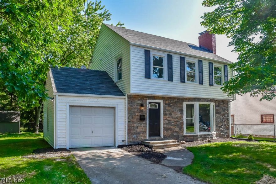 Completely remodeled 3 bedroom, 1.5 bath colonial with a finished lower level! This home has been transformed with new flooring, fresh paint throughout, a brand new furnace, A/C, hot water tank, windows and roof - move-in ready! The gorgeous living room features a huge bay window and an elegant fireplace with a decorative tile hearth. Arched doorways lead to the dining room with French doors to the covered back porch. Find your culinary inspiration in the brand new kitchen with granite countertops, new stainless steel appliances, tile backsplash and flooring, new cabinets and a pantry! Enjoy your morning coffee in the adorable breakfast nook with backyard views. Huge first floor half bath with tile flooring and updated vanity, too. Upstairs, all 3 bedrooms are generously sized. The master bedroom has 2 closets and there's nice built-in storage in the hallway. The large full bath has been remodeled with dual sinks, a new vanity, new flooring and tile shower surround. Enjoy extra living