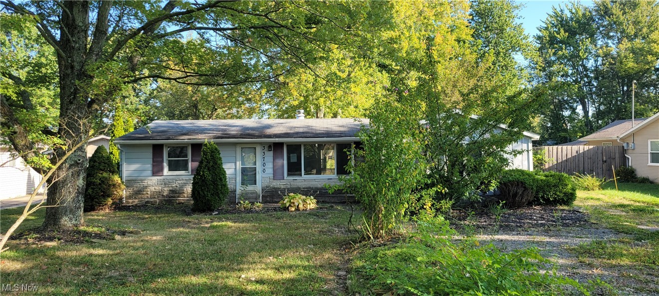 Welcome home to this 3 bedroom ranch that sits on almost half an acre. Lots of natural light, space and potential. There is a 2 car garage and a basement. Come and make this your own today!!